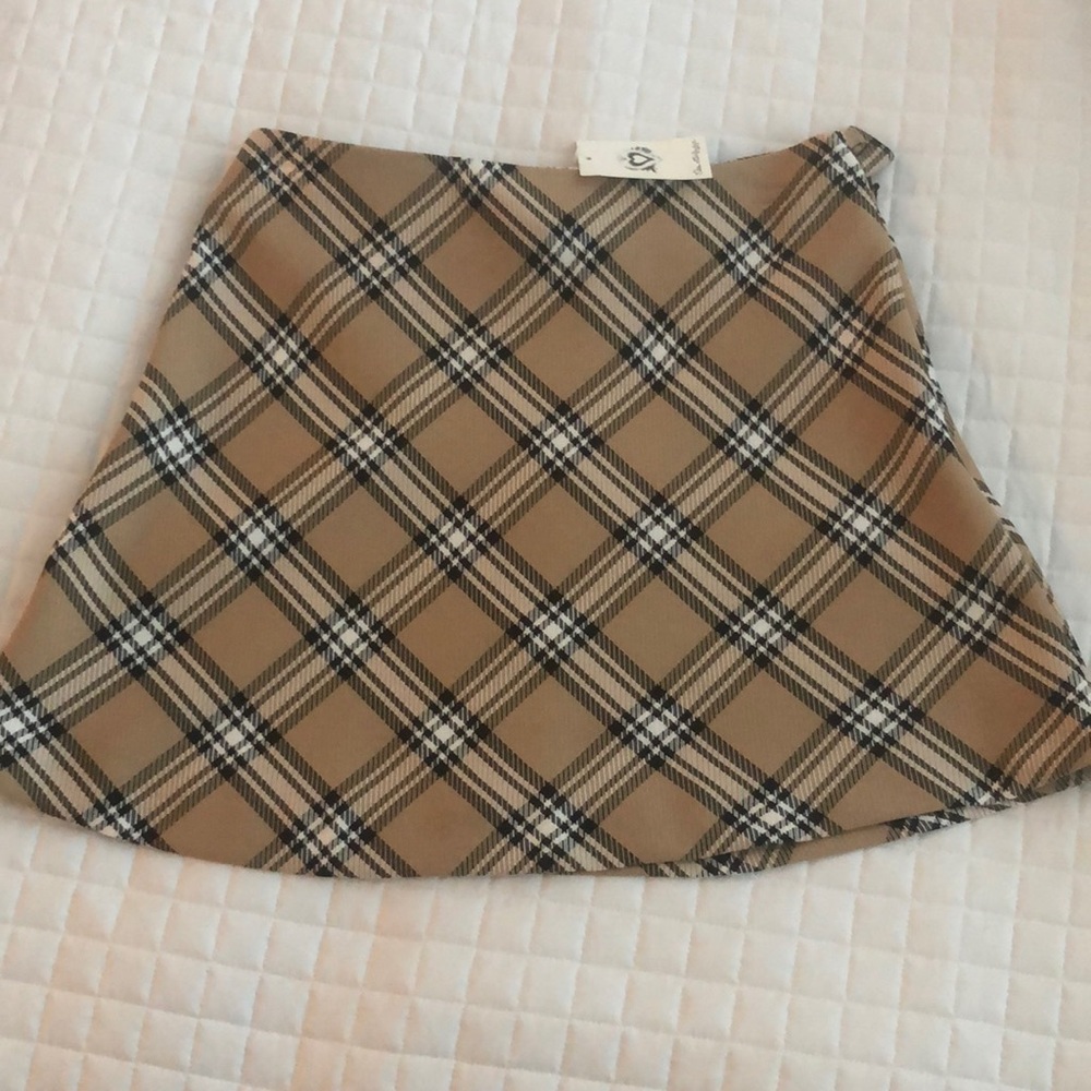 Plaid mini skirt. Brand new.